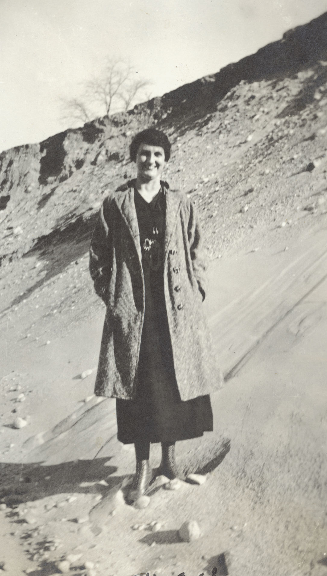 Woman in sand pit
